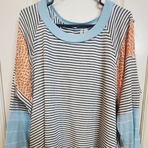 Est. 1946 Cute striped and patterned shirt.
